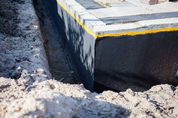 Professional Waterproofing technician working in Penns Grove, NJ